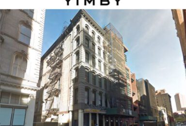 An image of a building with the word yimby on it.