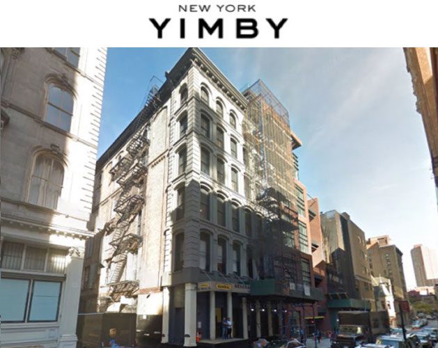 An image of a building with the word yimby on it.