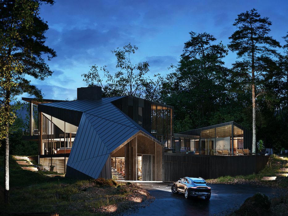 A modern house in the woods at dusk.