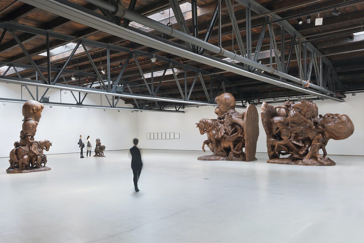 A large room with several sculptures in it.