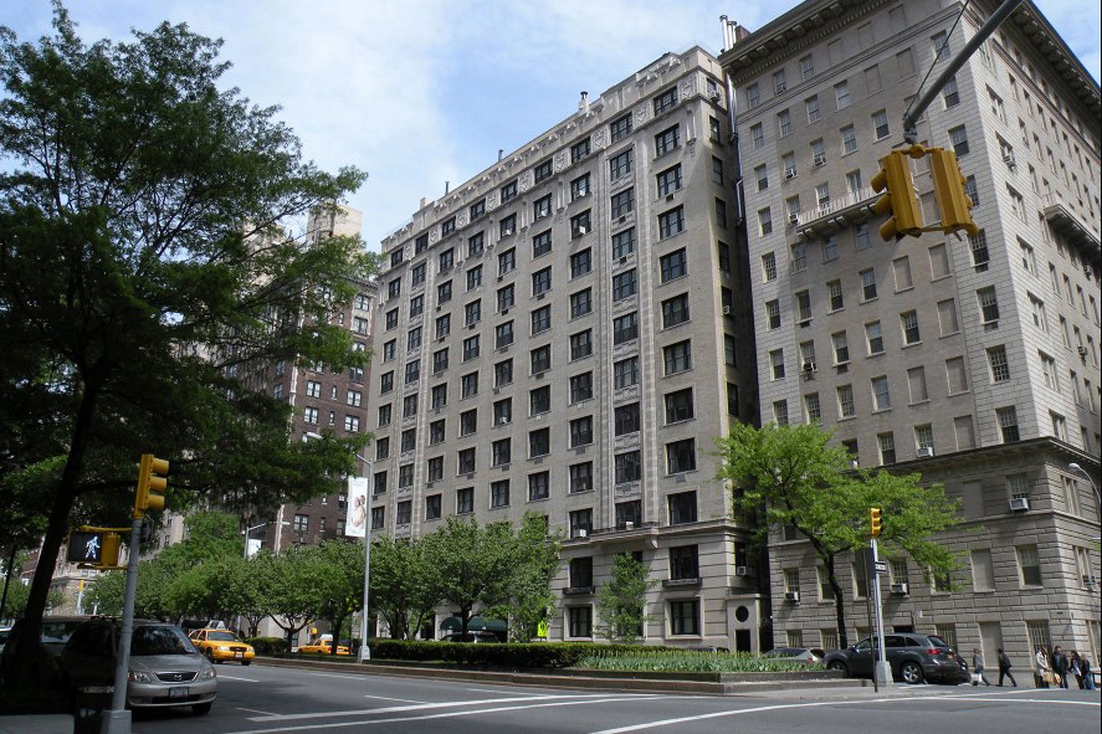 A large building on the corner of a street.