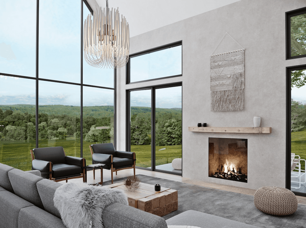 A living room with large windows and a fireplace.