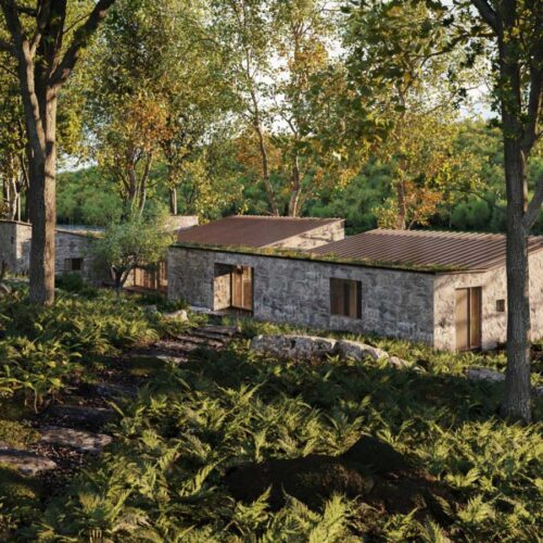A rendering of a stone cottage in the woods.